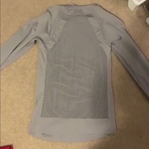 Athleta Long sleeves shirt with holes in back
